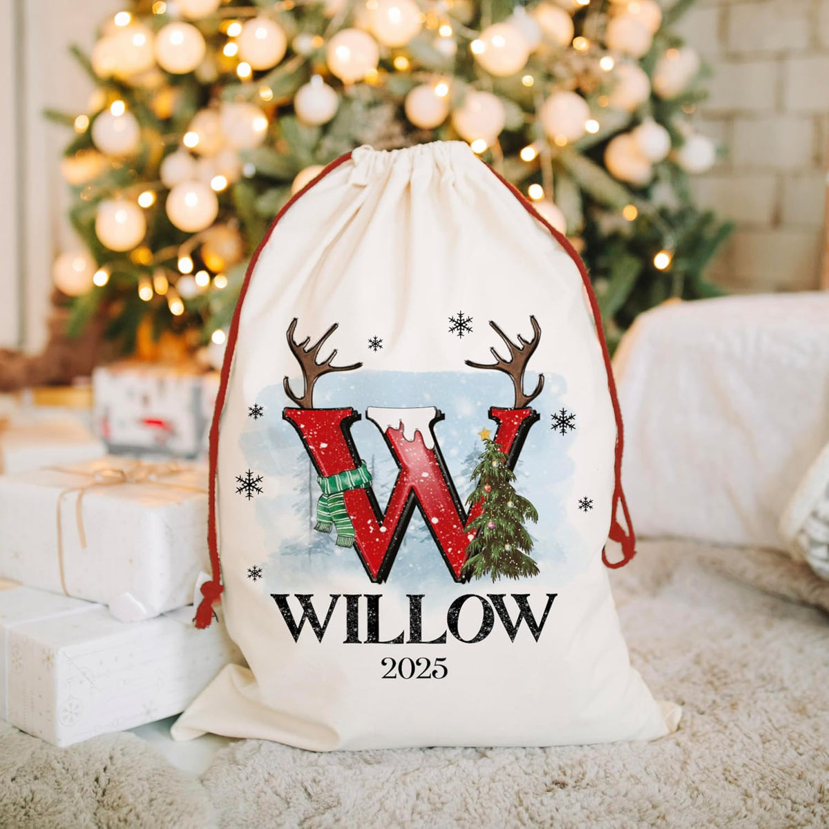 Zexpa Apparel Personalized Christmas Santa Sack, Custom Name & Initial Gift Bag with Reindeer Antlers and Snow Design, Large 24x16 Drawstring Present Bag for Kids, Adults, Family Holiday Decoration