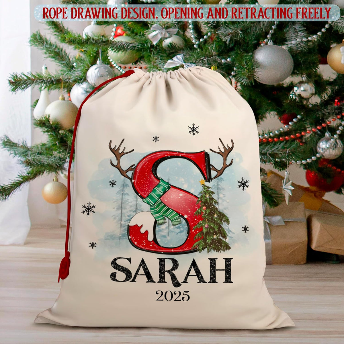Zexpa Apparel Personalized Christmas Santa Sack, Custom Name & Initial Gift Bag with Reindeer Antlers and Snow Design, Large 24x16 Drawstring Present Bag for Kids, Adults, Family Holiday Decoration
