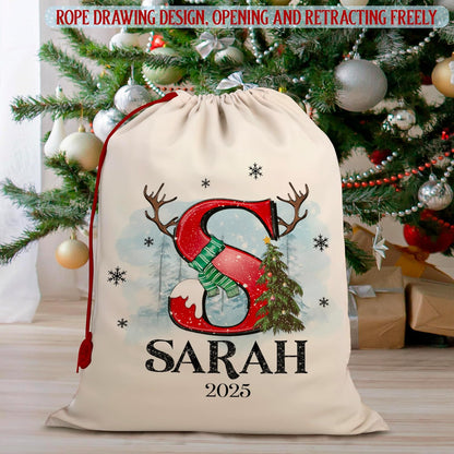 Zexpa Apparel Personalized Christmas Santa Sack, Custom Name & Initial Gift Bag with Reindeer Antlers and Snow Design, Large 24x16 Drawstring Present Bag for Kids, Adults, Family Holiday Decoration
